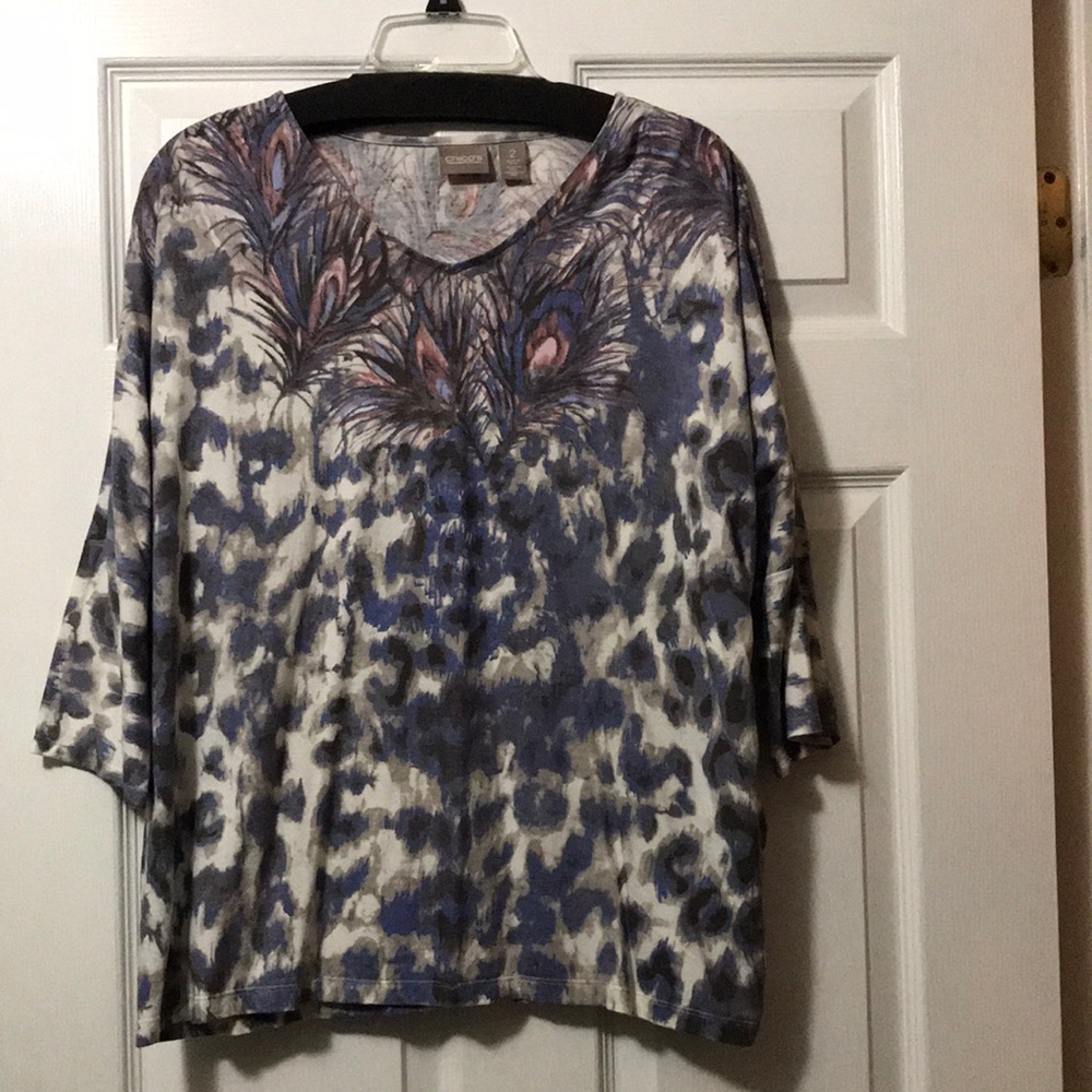 Shirt with Peacock feather embellished neckline.